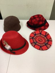 Four Hats From World Travelers Hat Collection