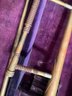 B/ 4 Pcs - Vintage Trombones In Cases - Bach Stradivarius & Conn, And 2 Folding Metal Music Stands
