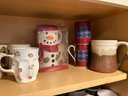 K/ 3 Shelves Of Asstorted Salt & Pepper Shakers, Mugs, Cruets, Measuring Cups & More