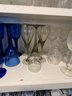 K/ 3 Shelves Of Asstd Glass Drinkware Barware - Variety Of Sizes & Types, Some Clear, Blue, Smokey Gray