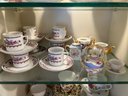 K/ 3 Shelves 32 Pcs Asstd Teapots & Tea Cups - 1 Music Box, Aynsley, Bethany Staffordshire, Colclough, Japan..