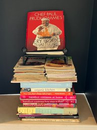 P/ Great Variety Of Cookbooks By Famous Chefs And Black Metal Book Holder