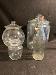 K/ 4 Pc Clear Glass Containers - 2 Large Round Canisters, 1 Small Round Canister, 1 Latch Lock Bottle