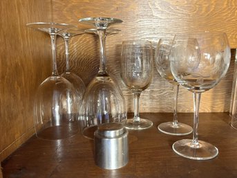 K/ Shelf 8pcs - Various Wine Glasses: 2 Etched, Most Clear, Stainless Wine Cork Etc