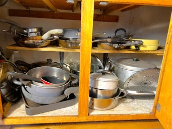 K/ Cabinet Full Of Assorted Pots, Pans And Cookware Including 2 Cast Iron Skillets Etc
