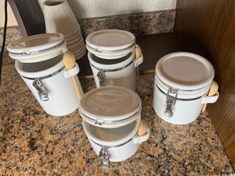 K/ 4  White Canister Set By A.K.Das W/ Latch Lock Seals And Wooden Spoons