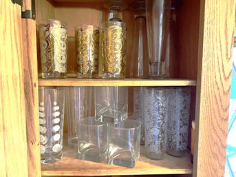 K/ 2 Shelves Of Assorted Glassware - Pilsner, Rocks, Shaker & Some Vintage Gold Swirl & Etched Rose