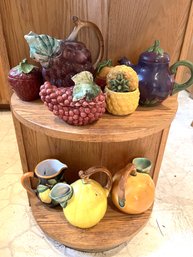 K/ 2 Shelves - 9 Asstd Whimsical Fruit Shaped Pitchers, Teapots, Sugar Bowl - Ravello, Salute, Jay Willfred