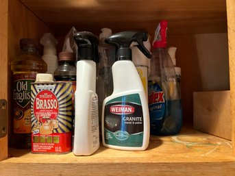 K/ Shelf Of Assorted Cleaning Products - Old English, Windex, Granite Cleaner Etc