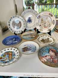 9 Pc's Assorted Collector Plates With 2 Black Plate Stands