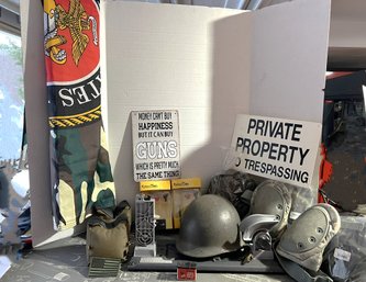 G/ Box Of Military & Gun Related Items Lot: Vintage Army Helmet, Knee Pads, Combat Packs, Signs, Flag & More