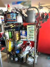 G/ Metal Shelf Unit With All Contents On Shelves: Lawn Care, Ornaments, Sprinklers, Spools Of Wire And More