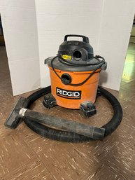 M/ RIDGID 9 Gal, 4.25HP Shop Vac With Hose And Attachments Shown - Model #WD09700