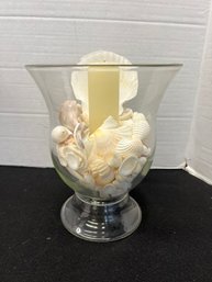 CR/A - Tall Glass Vase With Sea Shells And A Candle