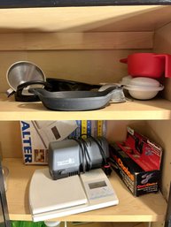 K/ 2shelves: Kitchen Items: Knife Sharpeners, Scale, Small Cast Iron Piece, Funnel And More