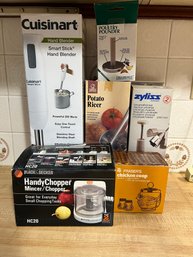 K/ 6 Boxed Kitchen Gadgets - Cuisinart Stick Blender, Poultry Pounder, Potato Ricer, 2 Choppers, 1 Egg Coddler