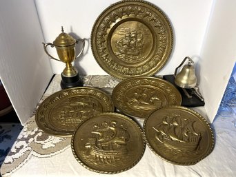 LR/ 8pcs Brass Lot: 5 Vintage Ship Plates By Peerage England, 2 Covered Chalices, 1 Bell With Hammer