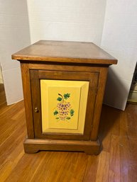 2C/ Wood End Table/Cabinet With Stenciled Front Door And Small Holder Inside On Door