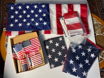 O/ 5 Large USA Flags And 12 Plus Handheld Flags