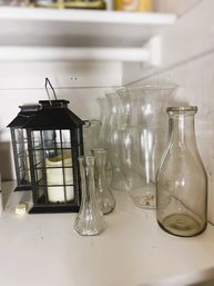 DR/ Shelf 9pcs - Assorted Battery Candle Lanterns, Clear Glass Pitcher, Vases, Hurricane Shades