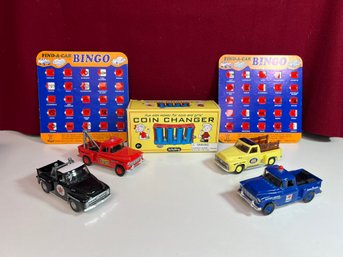 AD/ Box 7pcs - Vintage Childs Play - Set Of 4 Matchbox Trucks, Coin Changer, Car Bingo