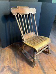 DR/ Antique Wood Frame Cane Seat Spindle Back Low Rocking Chair