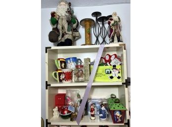 B/ Top 3 Shelves - Christmas Items: Santa Figures, Pillar Candle, Mugs, Ornaments Etc