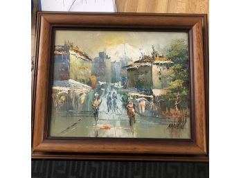 Framed Painting Of City Scene With Mountain In Background