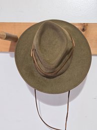 Green Hat Brown Rope