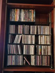 DVD And CD Collection With Wire Rack