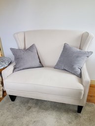 Loveseat Cream Upholstered With 2 Gray Pillows