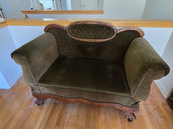 Antique Loveseat Green Upholstery  .  The Arm On The Left Side Needs An Adjustment, It Sometimes Falls.