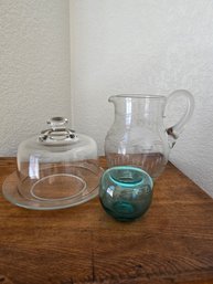 Glass Pitcher, Cheese Plate And Green Glass Candle Holder