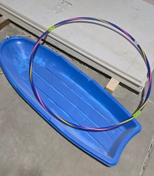 Blue Sled And Hula Hoop