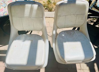 Two New White Boat Seats On Silver Stands