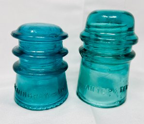 Two Teal Insulators