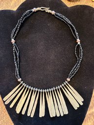 African Black Beaded Necklace With Bronze Fringe