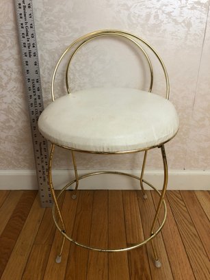 Low Metal Brass Colored Chair