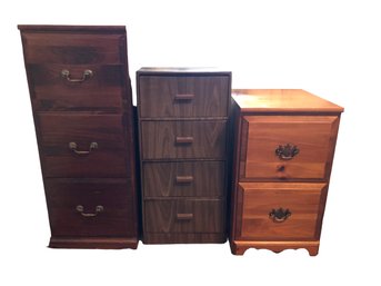 3 File/ Storage  Cabinets 2 Wood, 1 Cardboard.