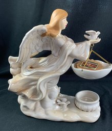 Yankee Candle Angel Holding Dove With Tart Burner.