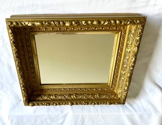 Gold Painted Wood And Gesso Mirror.