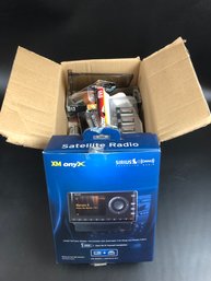 Sirius XM Radio And Box Of Batteries