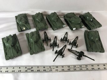 Eight Toy Plastic Tanks, And Six Howitzers