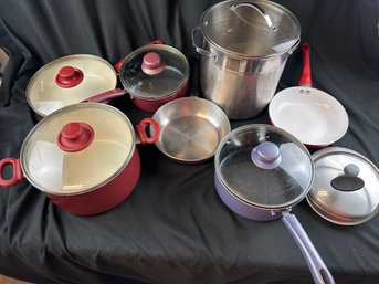 Large Assortment Of Pots And Pans And Lids