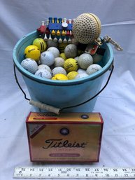 New Dozen Titleist Golf Balls, And Bucket Of Used Golf Balls