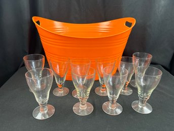 Orange Container And 10 Glasses