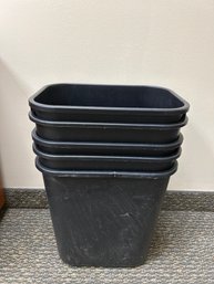 Five Plastic Trash Cans