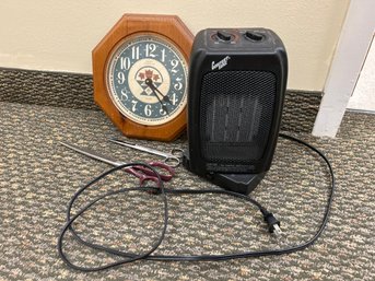 Small Heater And Wall Clock And Scissors