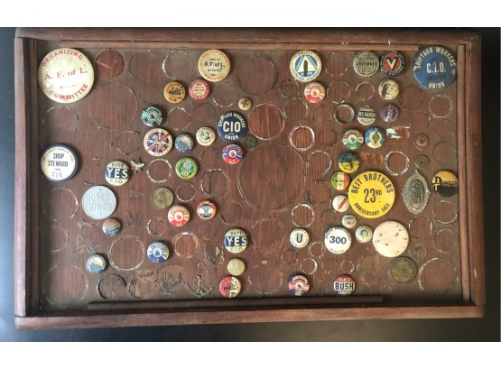 Assorted Vintage Pin Back Buttons And Tokens Glued To Board