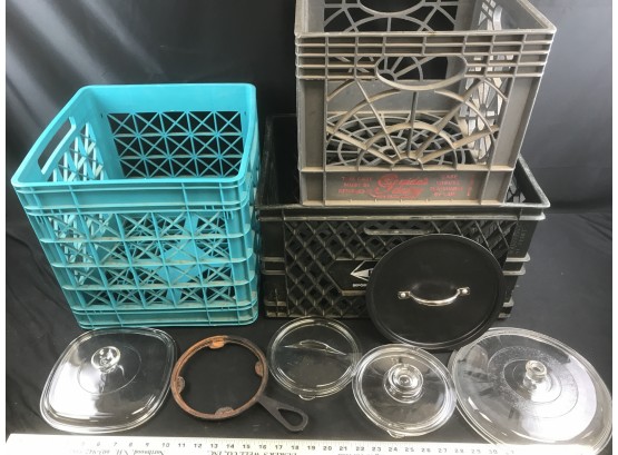 Three Milk Crates With Various Old Glass Lids And Metal Trivet